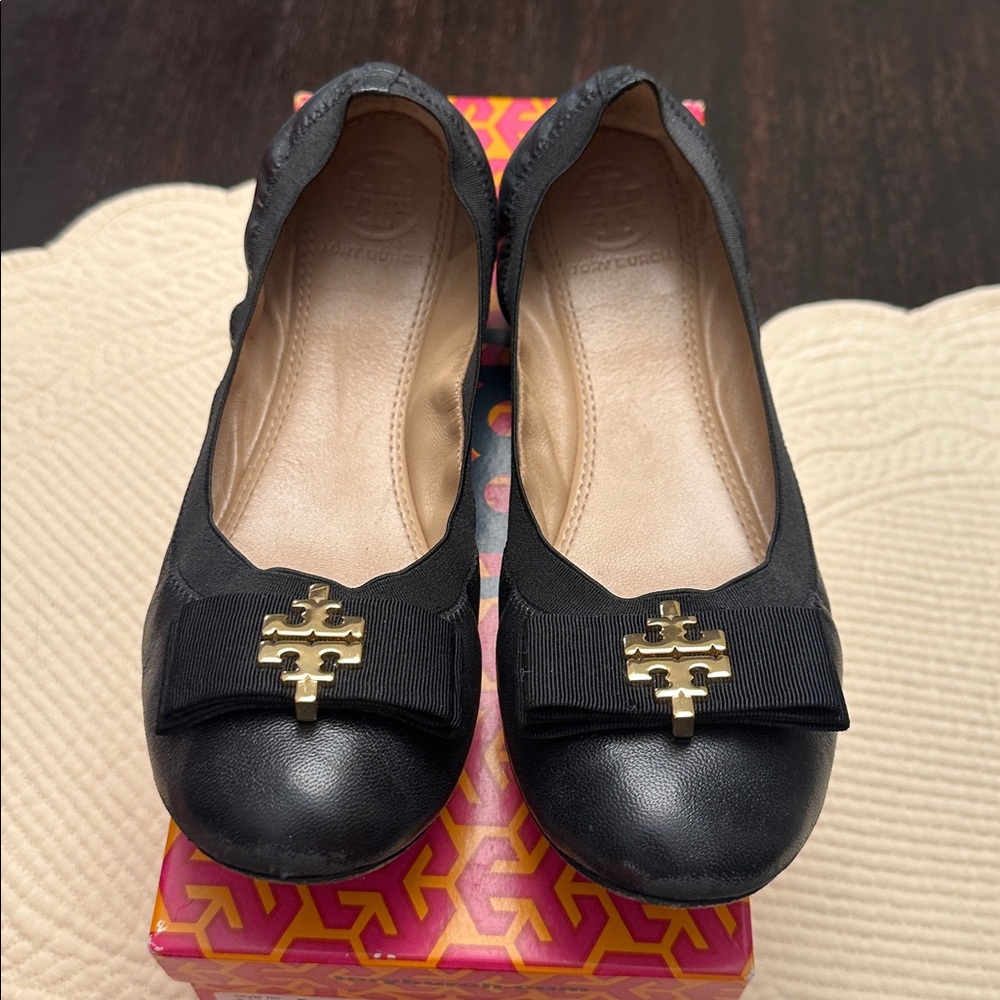 Tory Burch Black Flats with Gold Emblem